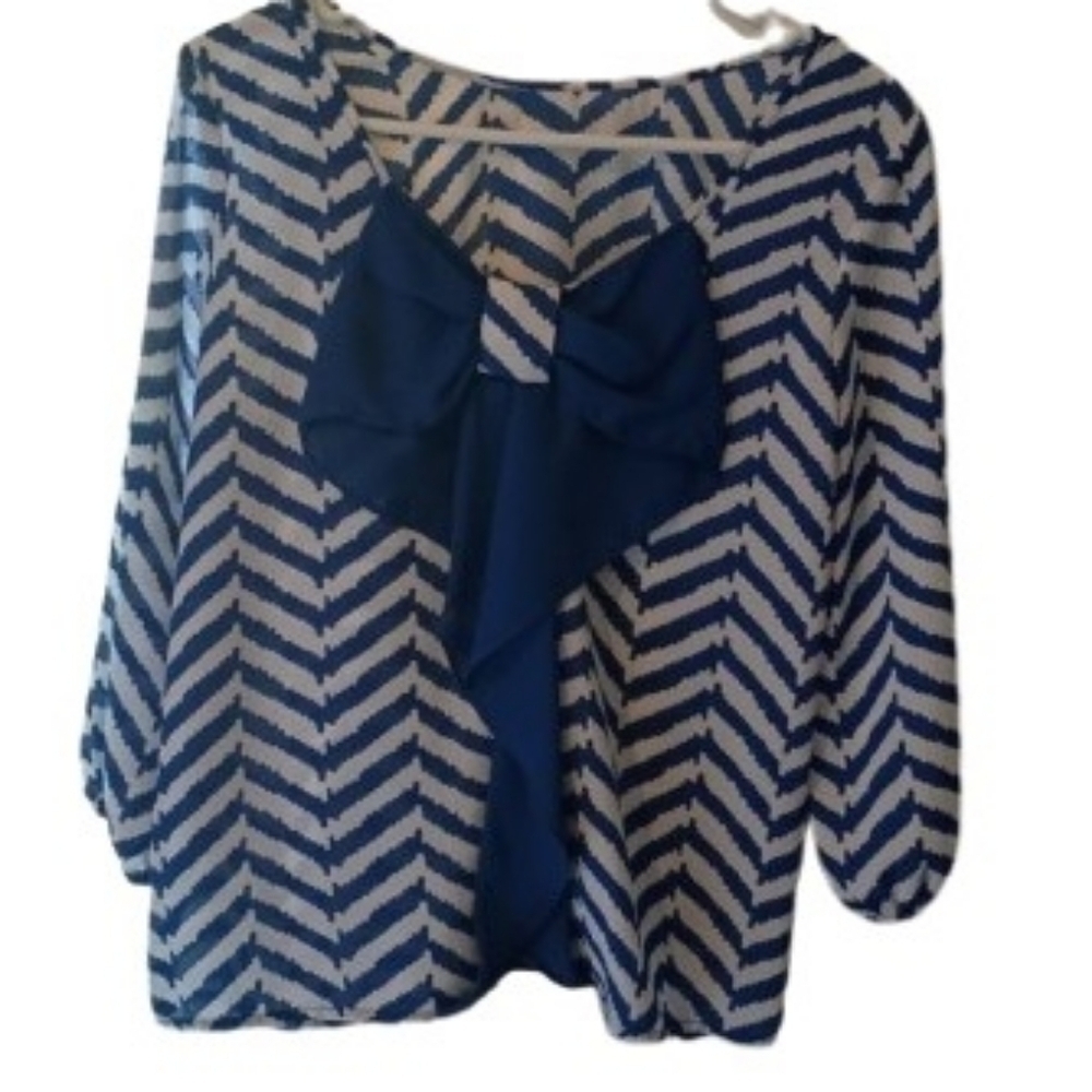 Blue white blouse with flowing back bow‎